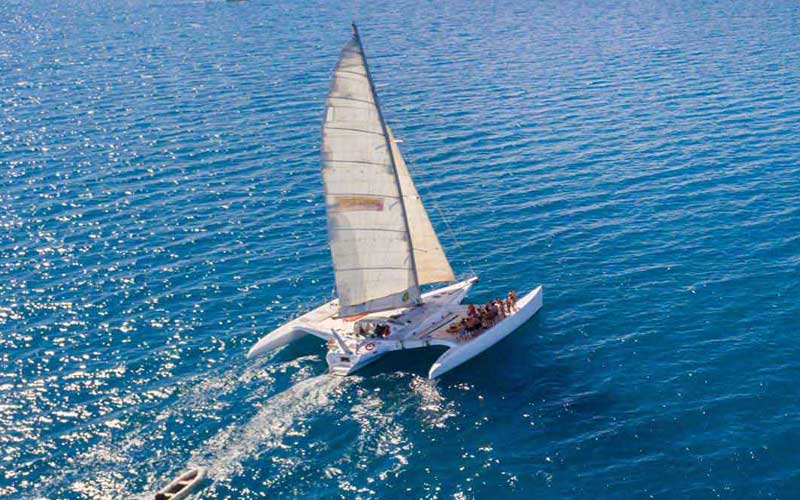 Avatar Whitsundays Tour departing Airlie Beach while sailing